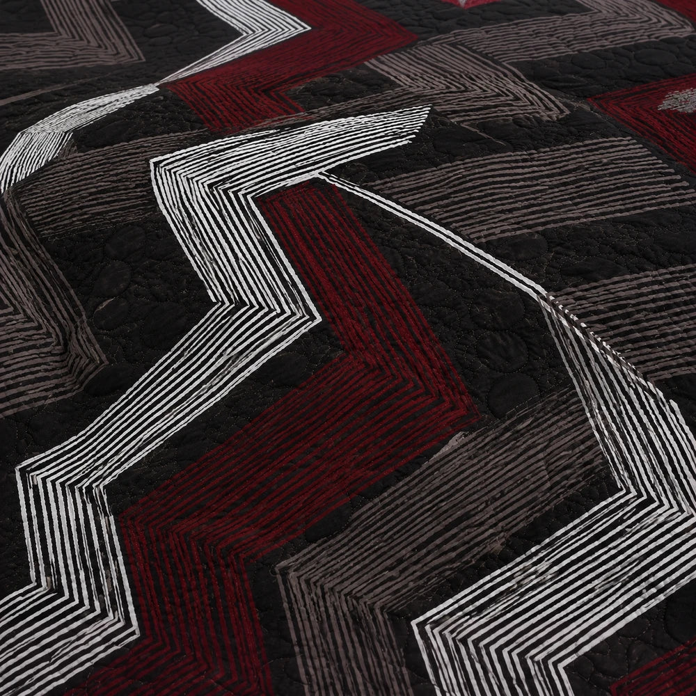 5PC Tela Milano Printed Quilt Set featuring a bold black quilt with white and red geometric line patterns