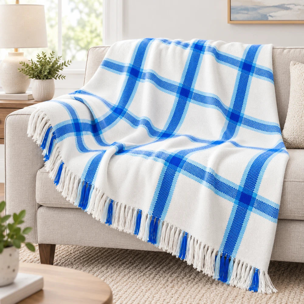 Traditional Frilled Check Blanket in white with bold blue plaid pattern, soft cozy throw for living room