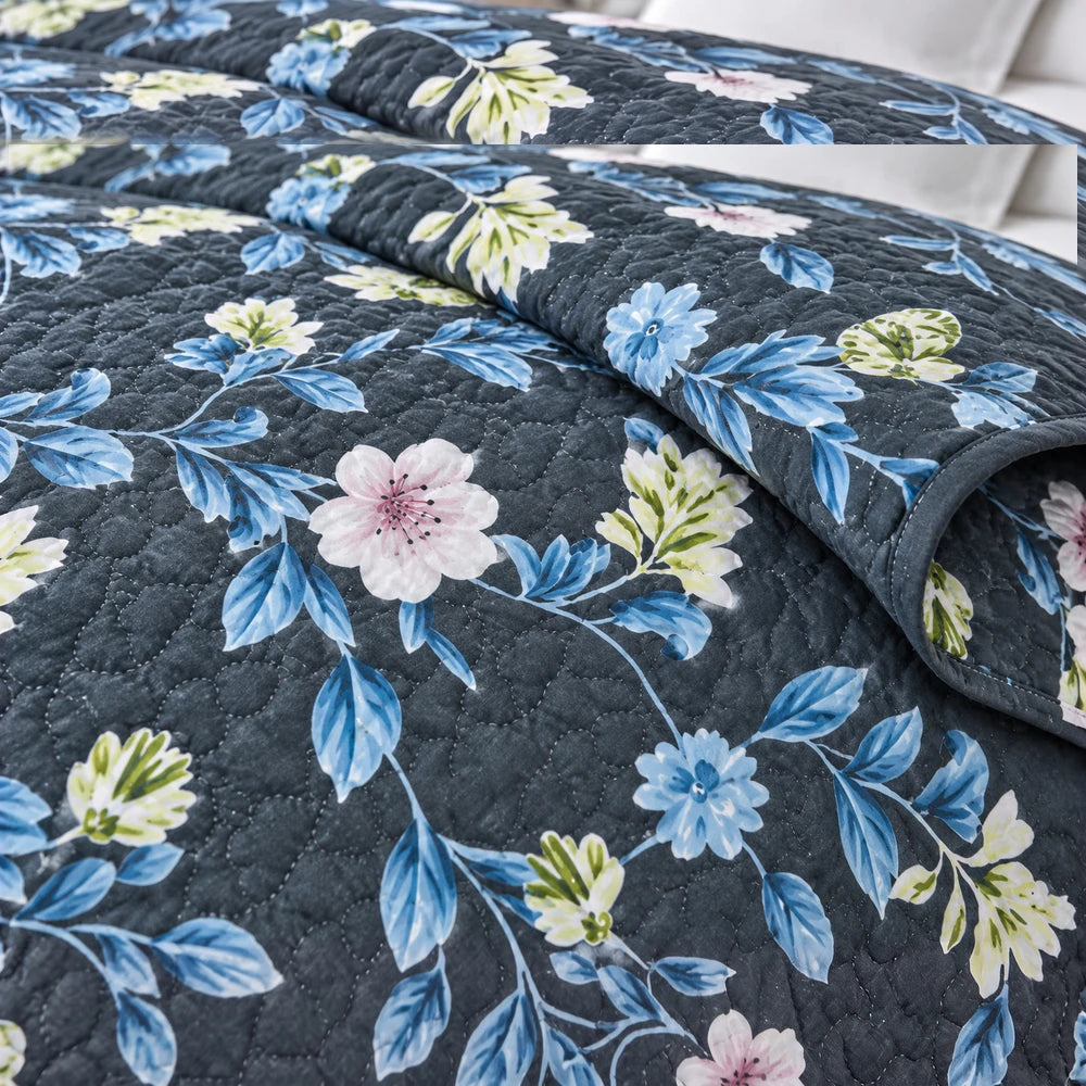 Ultrasonic 1-Piece Printed Quilt with navy background and blue floral pattern, 220 x 200 cm for bed coverage.