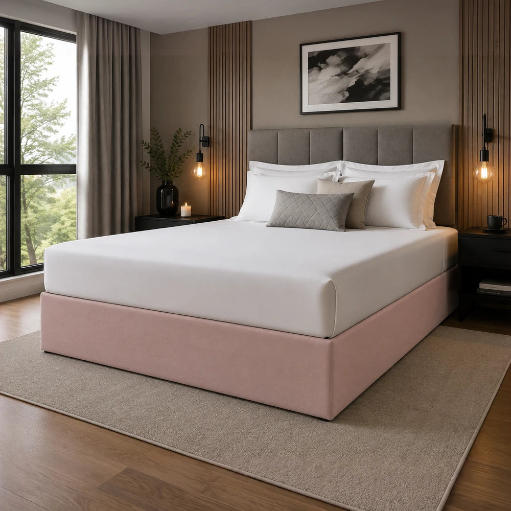 Whisper Soft Microfibre Bedwrap in blush pink base with white top, shown on a neatly made bed with neutral pillows and