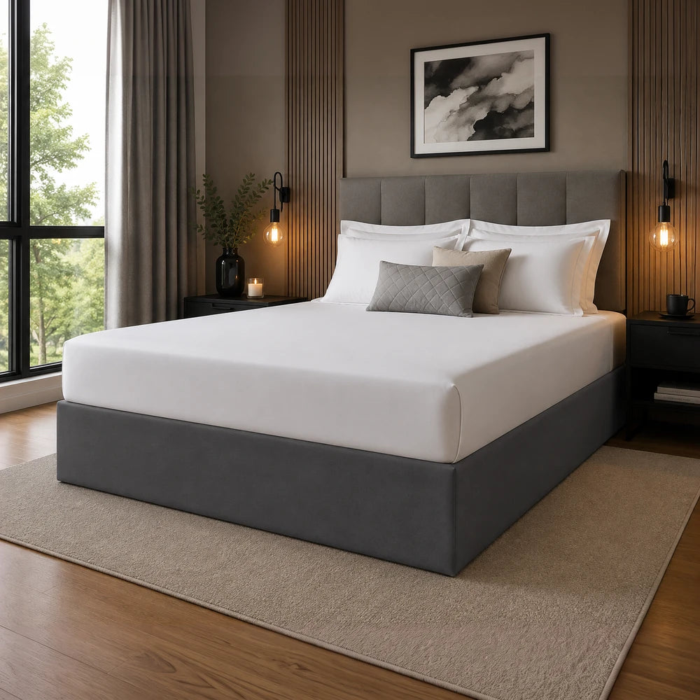 Whisper Soft Microfibre Bedwrap on a grey upholstered platform bed with white bedding in a modern bedroom.