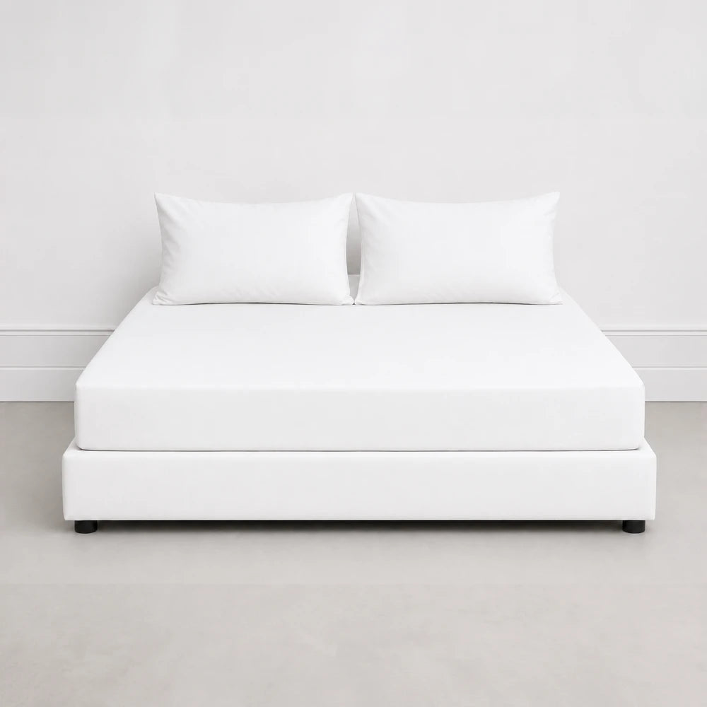 Whisper Soft Microfibre Easybed Combo Set shown on a clean white bed with two white pillows, smooth fabric finish.