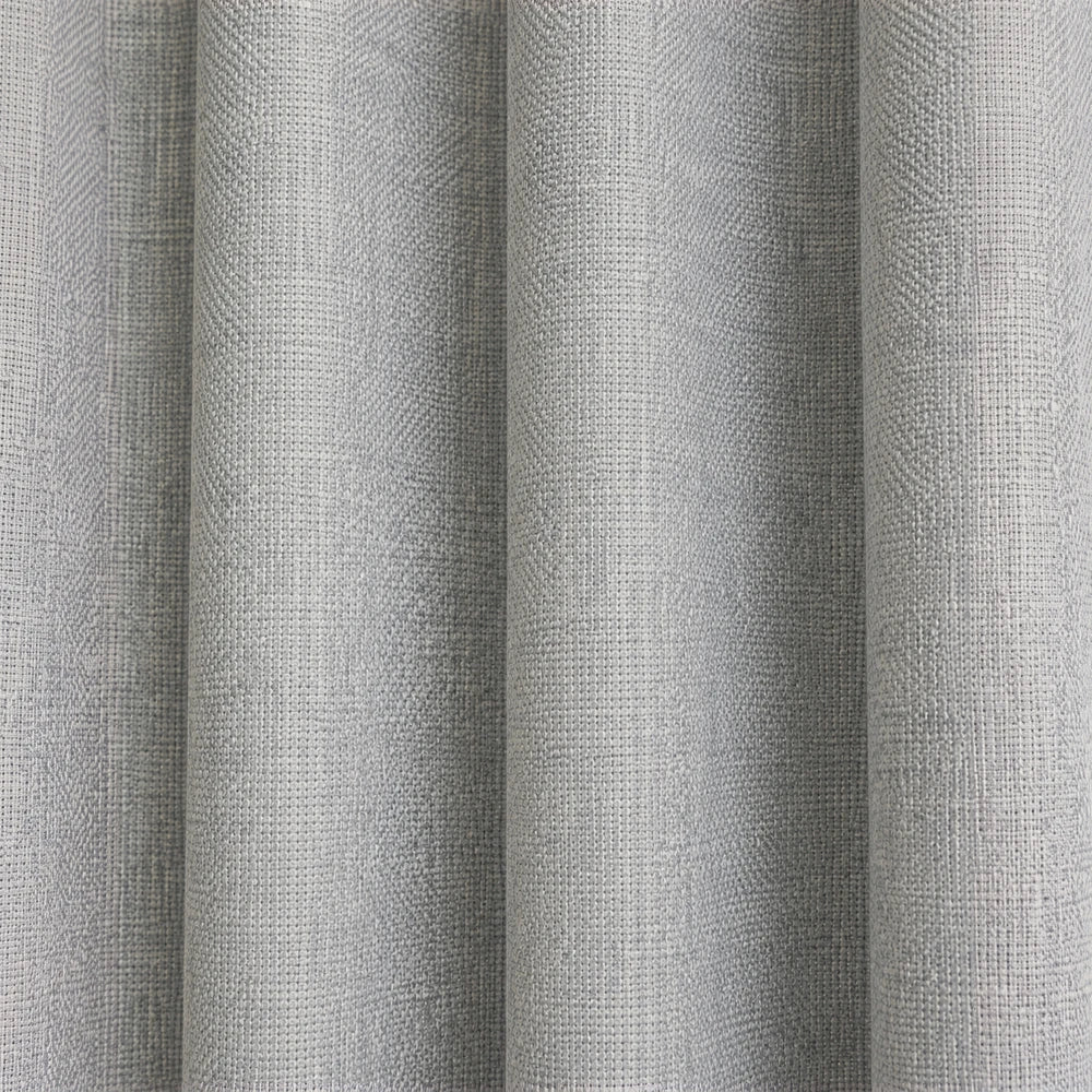 Woven Athens Textured Eyelet Unlined Curtain in light gray fabric with visible weave, suitable for living room or bedroom.