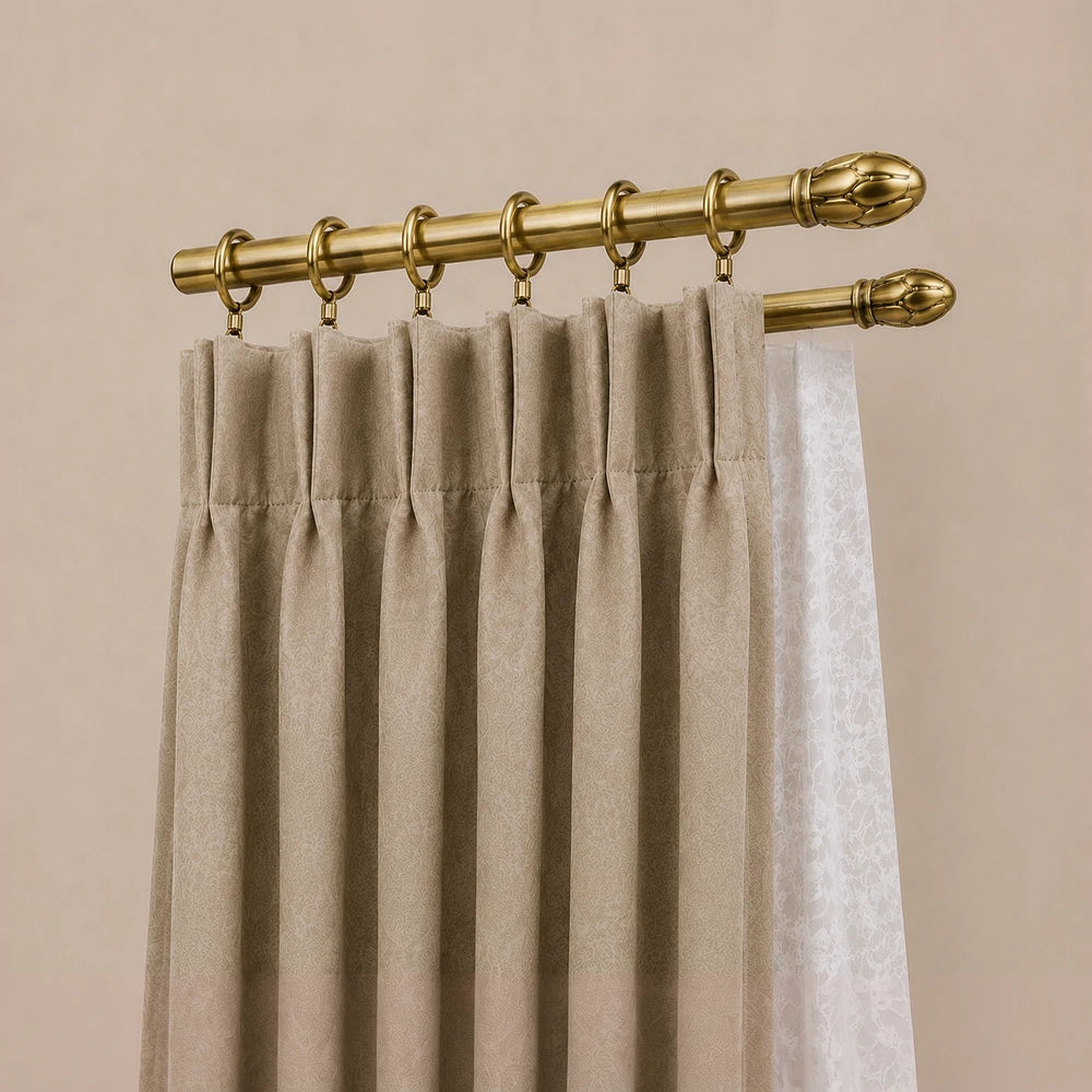 25mm curtain rod rings on a gold-finish rod with beige patterned curtains, showing hardware details.
