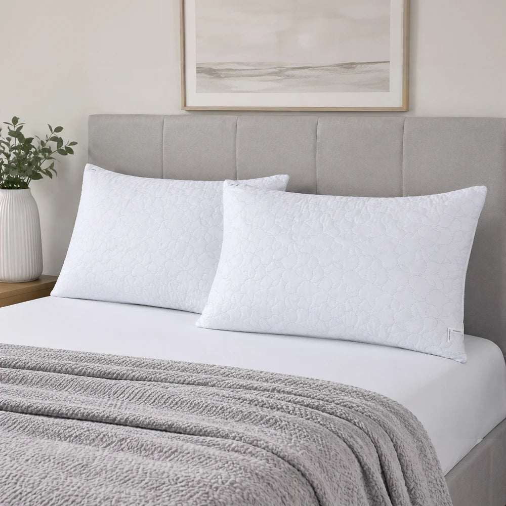 After Hours Living Quilted Pinsonic Pillow in white with a subtle quilted pattern, featuring 650gsm fill for plush,