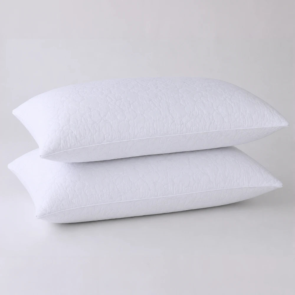 After Hours Living Quilted Pinsonic Pillow in white with a textured quilted cover, designed for comfort and support.