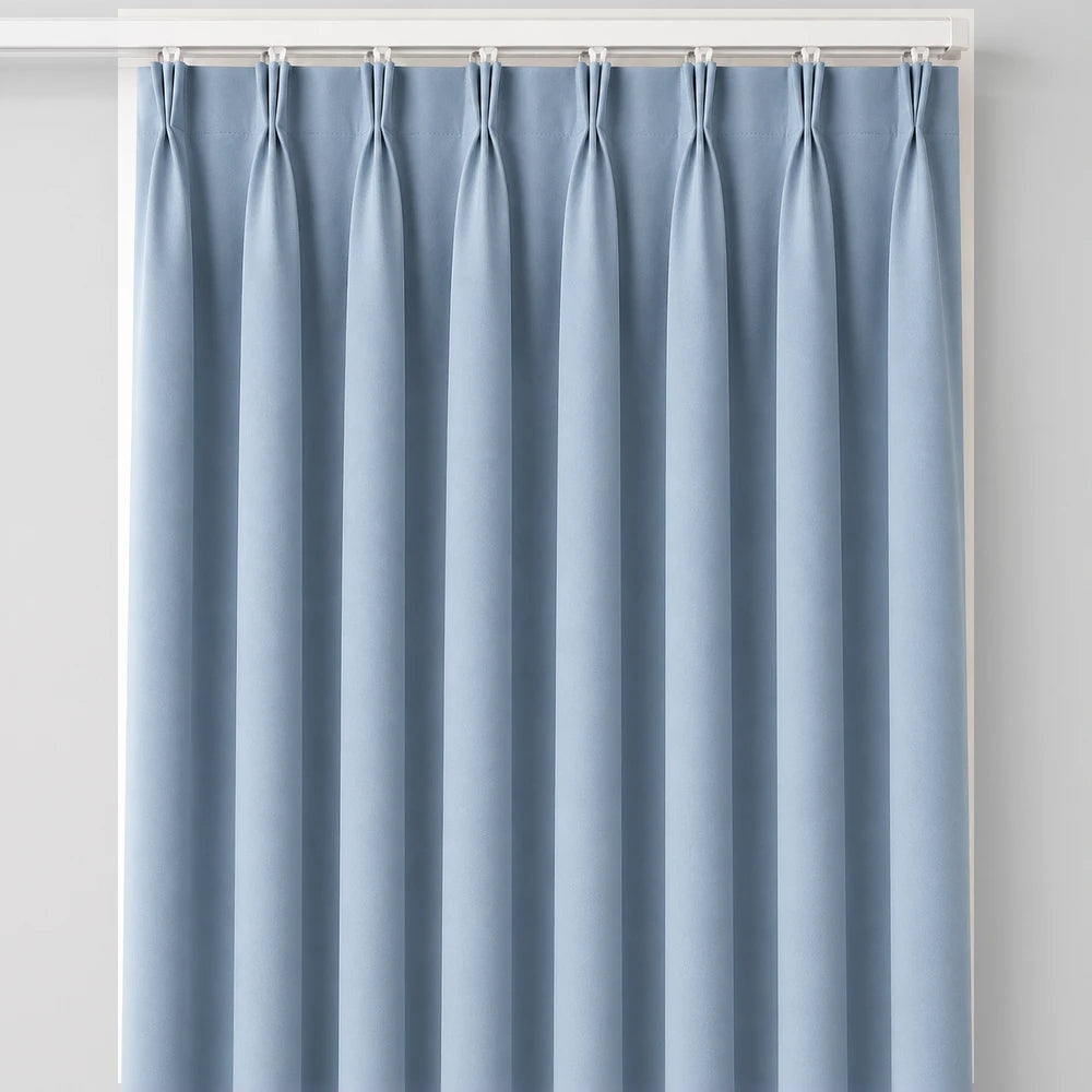 The Bahamas Unlined Taped Curtain in light blue with taped header and soft folds