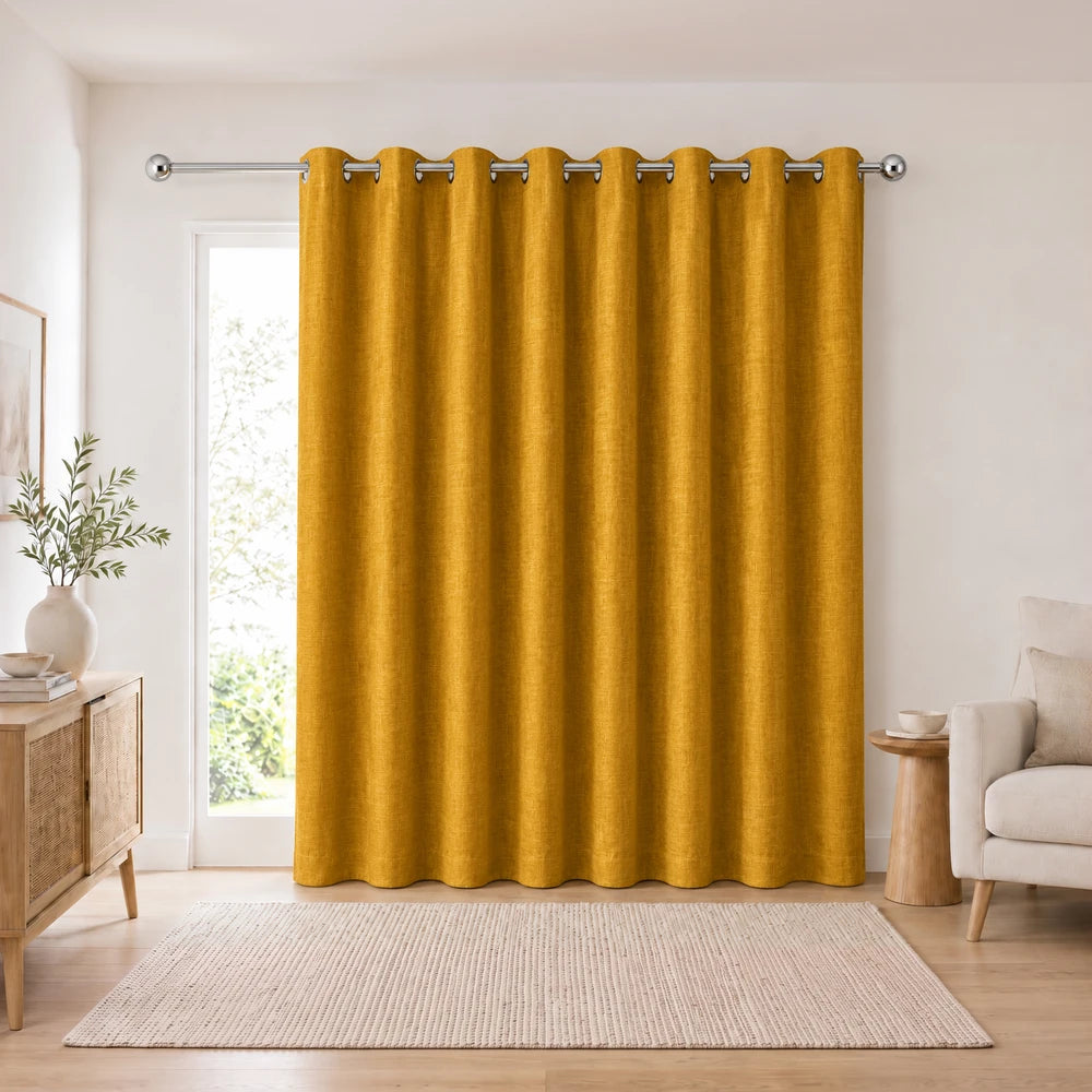 Barkweave Eyelet Lined Curtain in warm mustard yellow featuring metal grommets and lined fabric for added fullness.