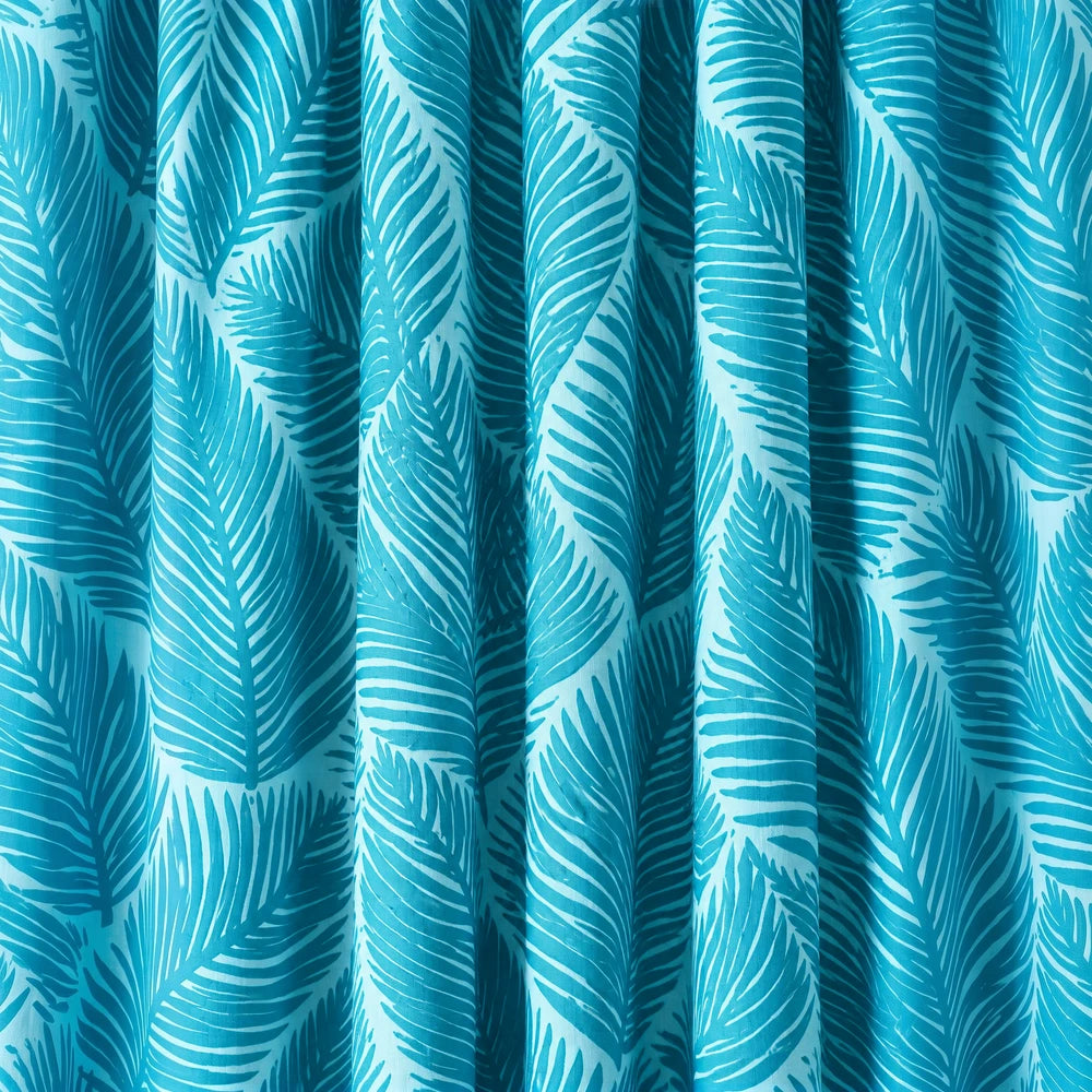 Bold Palm Leaf Paste Print Taped Lined Curtain in teal blue with palm leaf pattern, ready for window decor.
