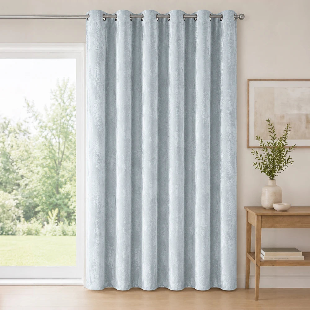 Carducci Abstract Velvet Unlined Eyelet Curtain in light blue, soft velvet fabric with a classic eyelet header.