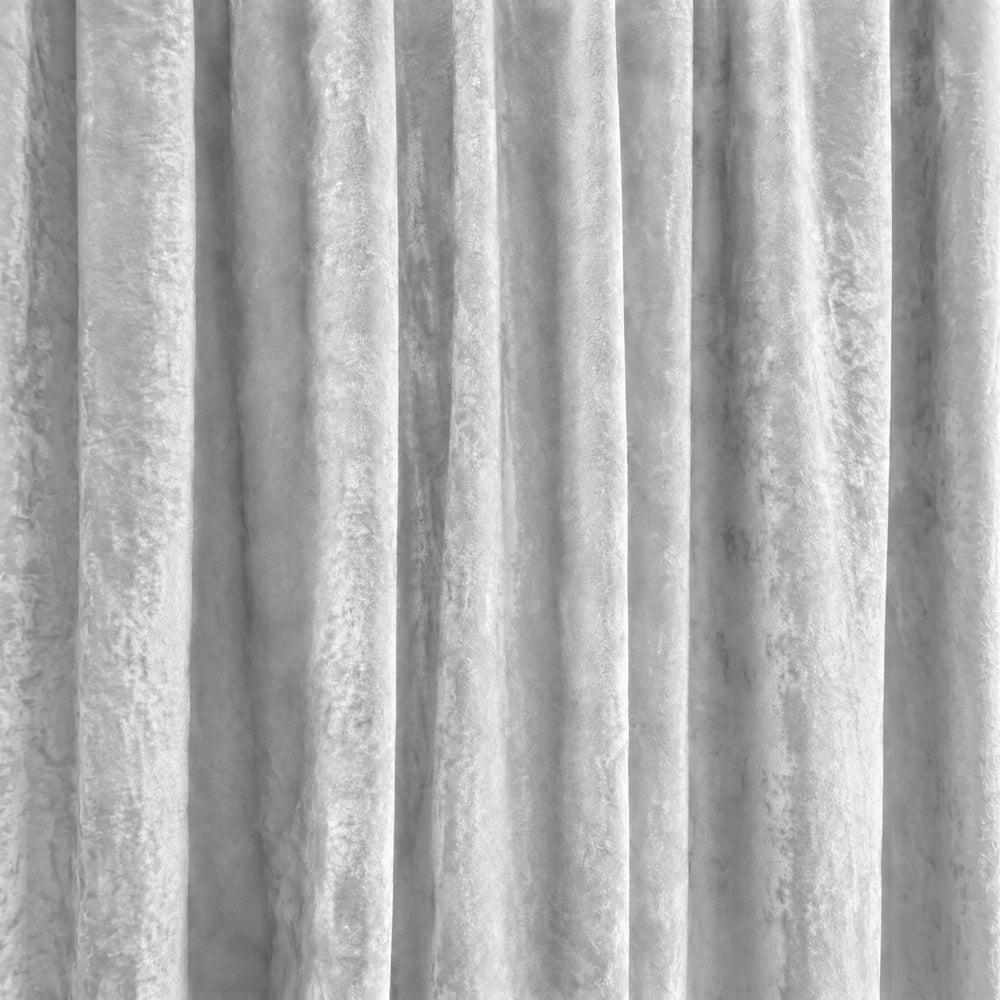Carducci Abstract Velvet Unlined Eyelet Curtain in light gray velvet with a soft, textured drape for a refined look.