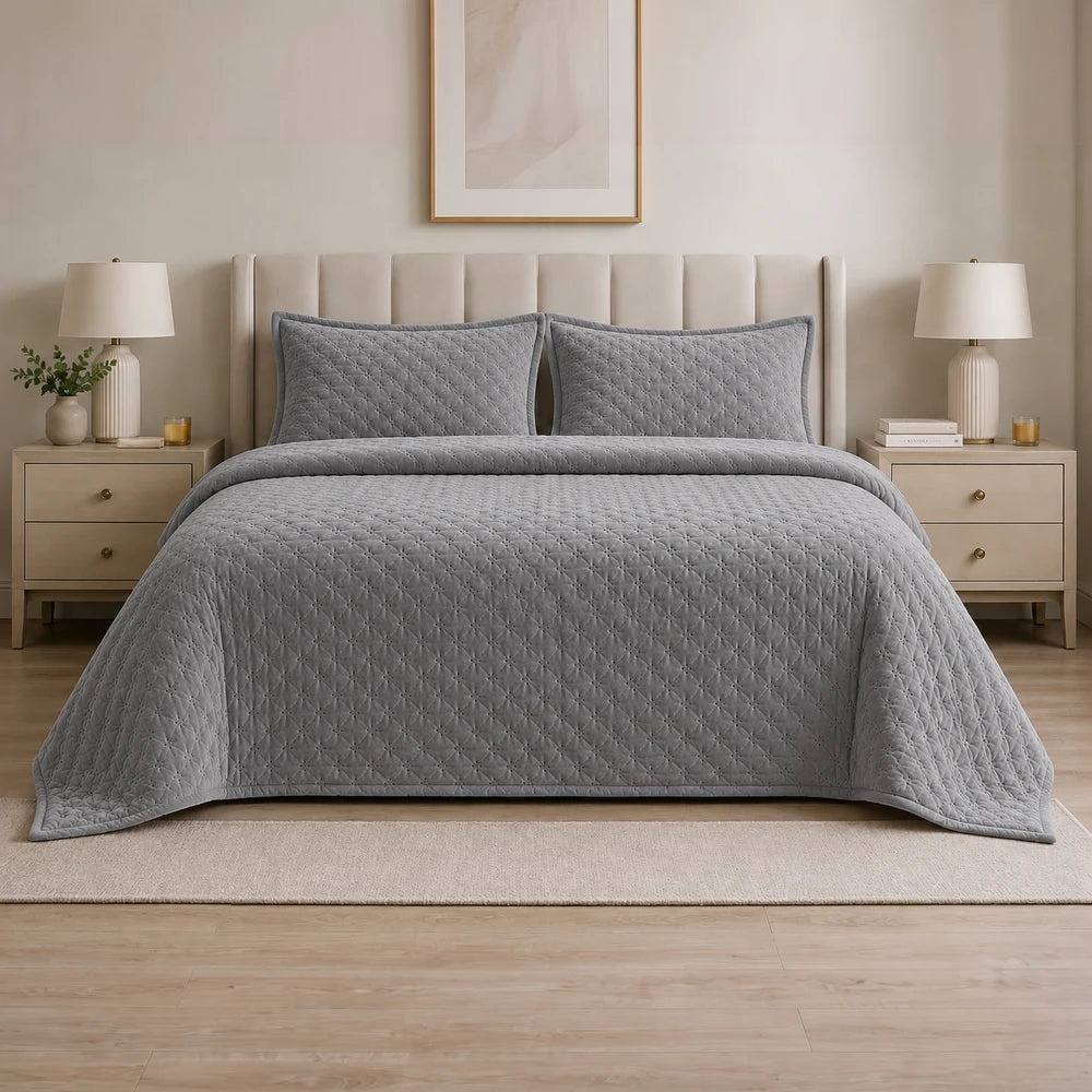 Carducci Velvet Pinsonic Quilt Set in gray with matching storage bag, quilted diamond stitching on the bed.
