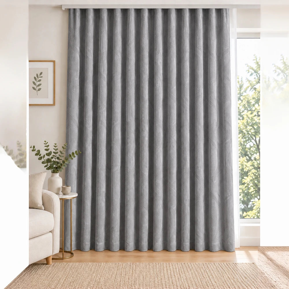 Carducci Velvet Textured Unlined Taped Curtain in soft gray, featuring subtle geometric pattern and elegant drape.