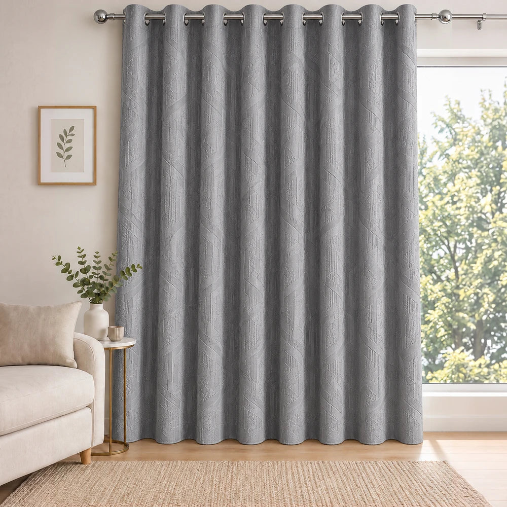 Carducci Velvet Textured Unlined Eyelet Curtain in soft gray with subtle geometric pattern, ideal for living rooms or