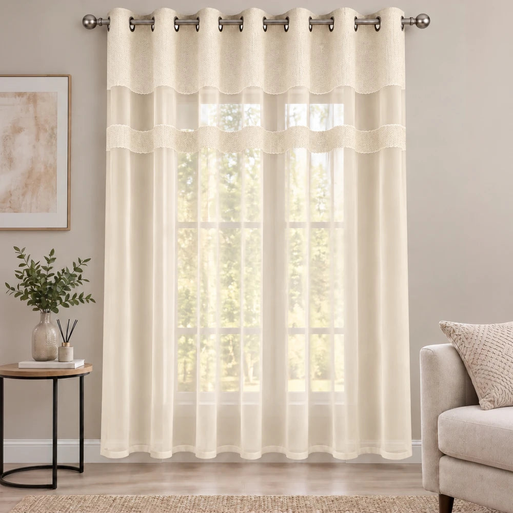 Cecile Balza Alter Eyelet Curtain in ivory with sheer panels and decorative lace bands, hangs from metal grommets.