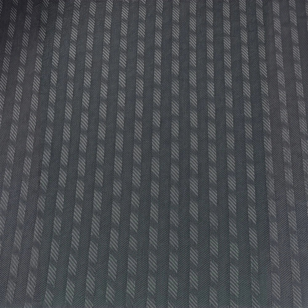 Charlie Textured Eyelet Lined Curtain in charcoal gray with a woven diagonal stripe pattern and light lining.
