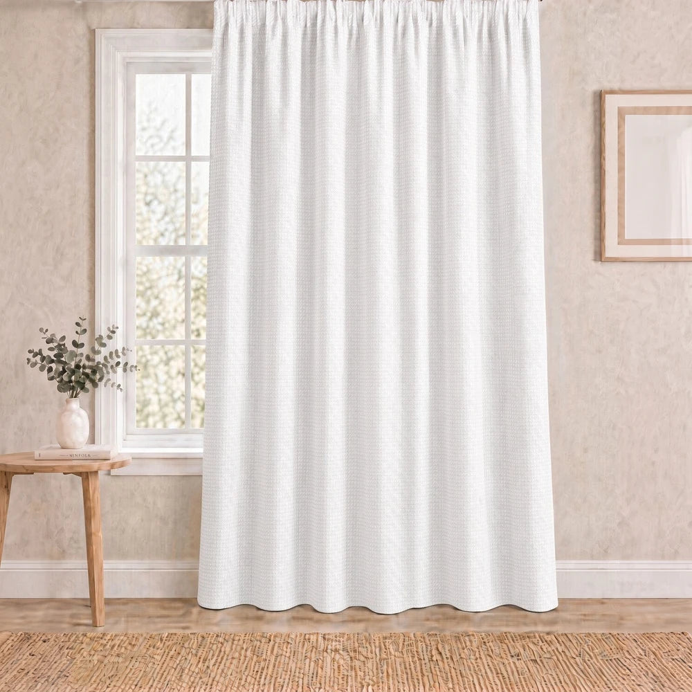 Charlie Textured Taped Lined Curtain in white showing subtle texture and a soft drape for airy privacy.