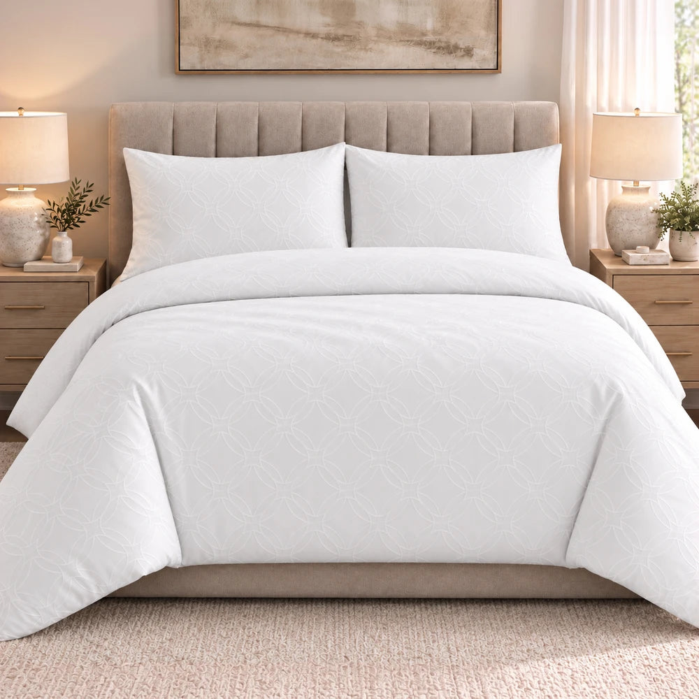 Cotton Co Ashley Duvet Cover Set in white with a subtle geometric quilted pattern and soft cotton fabric for a clean bedroom