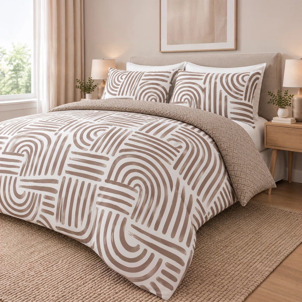 Cotton Co Zaria Duvet Cover Set in beige with geometric brown pattern, includes duvet cover and matching pillow shams.