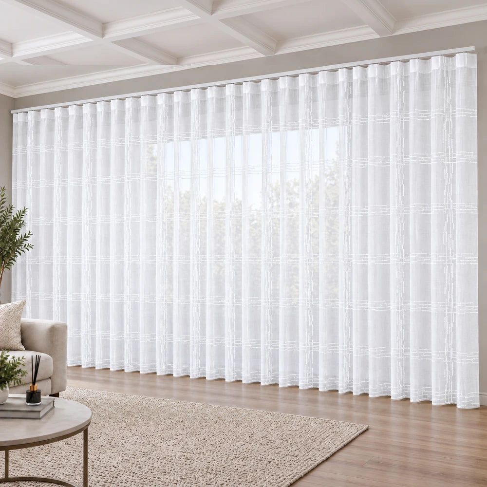 Embroidery on slub linen 5m taped curtain in white with subtle stitch pattern for airy, light-filtering coverage.