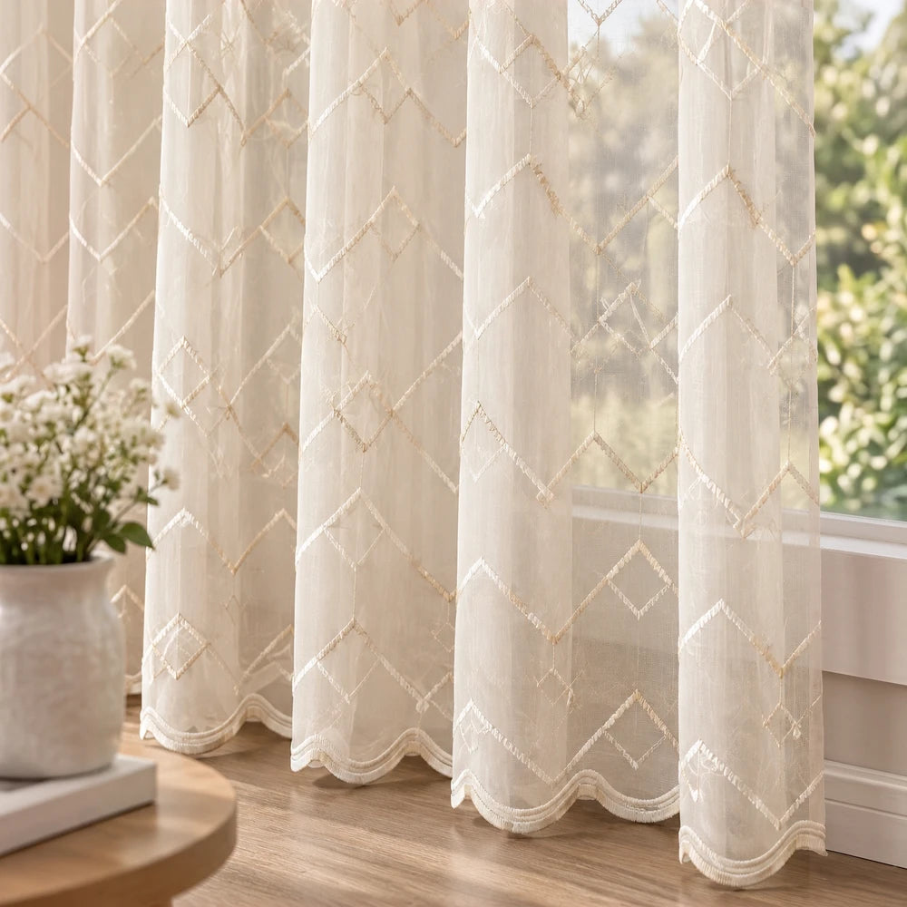 Embroidery on plain voile curtain with geometric diamond pattern, 5m taped curtain in soft beige for an airy, elegant look.