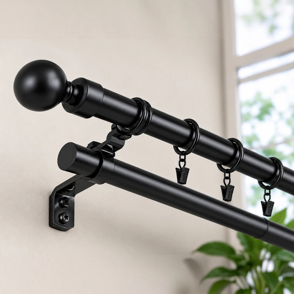 Extendable curtain rod in black metal with adjustable length from 1.5 to 3.0 meters, featuring decorative finials and