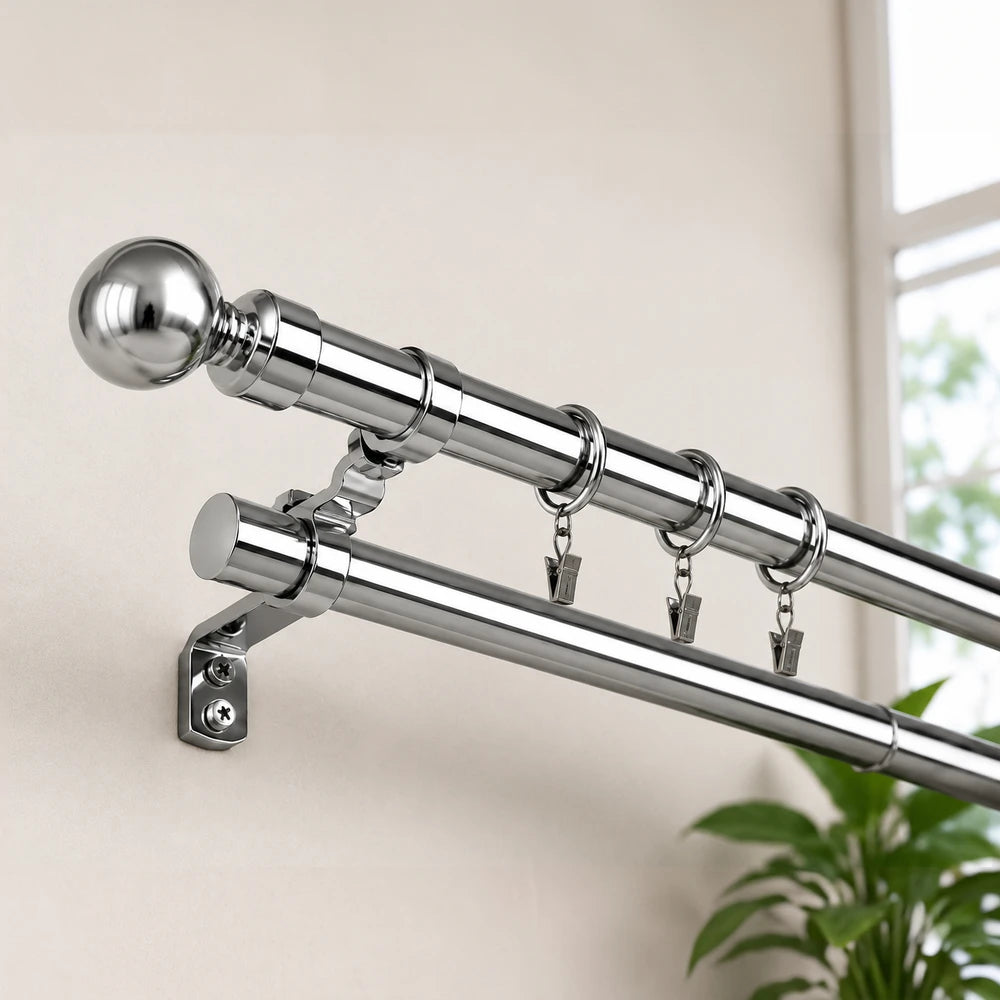 Extendable curtain rod in chrome finish with wall mount brackets and clip rings, adjustable from 1.5m to 3.0m.