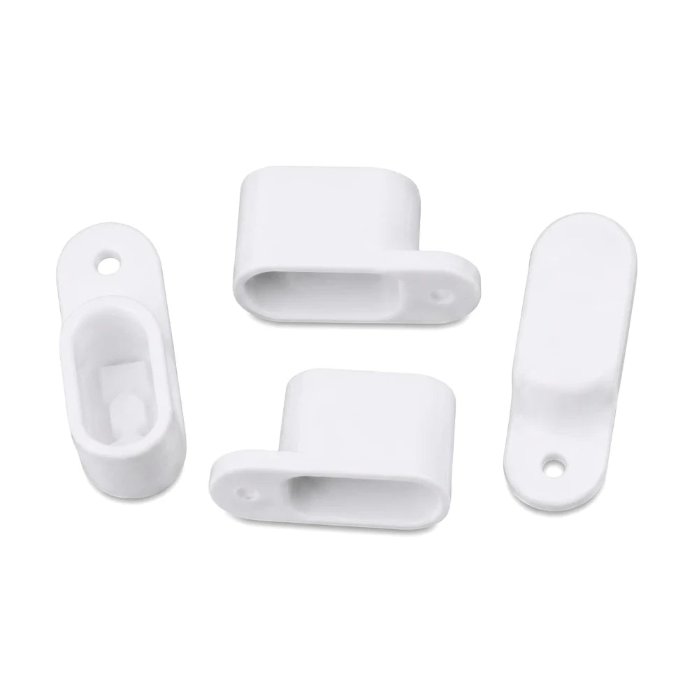 Four white plastic curtain track end caps, visible from multiple angles, designed for oval curtain rods.