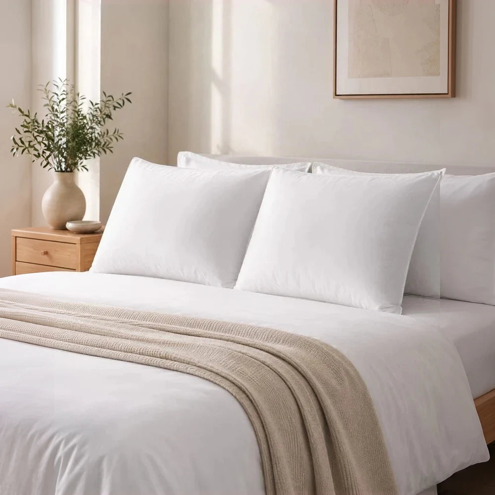 2 Pack Hollowfibre Standard Pillows in white with medium firmness for everyday comfort