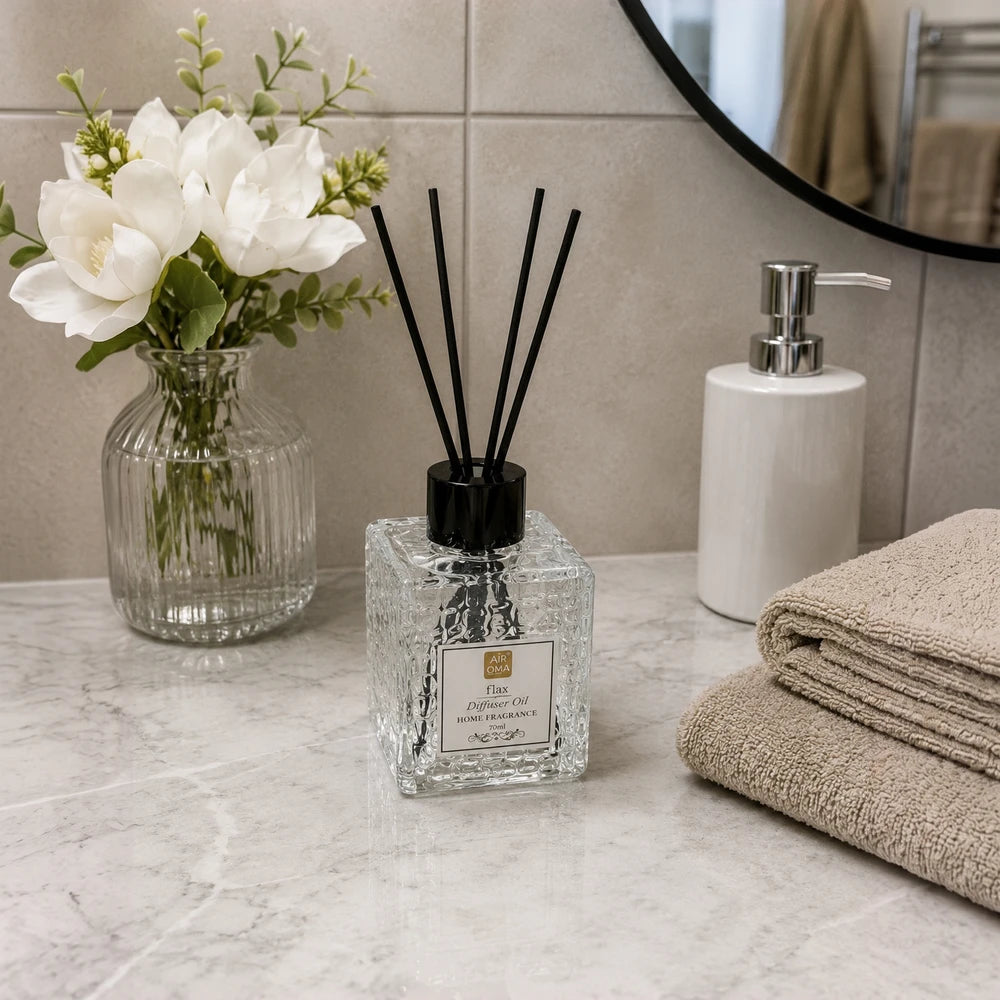 Luxury Home Fragrance Reed Diffuser with Sticks in a textured glass bottle featuring black reeds for a subtle, long-lasting