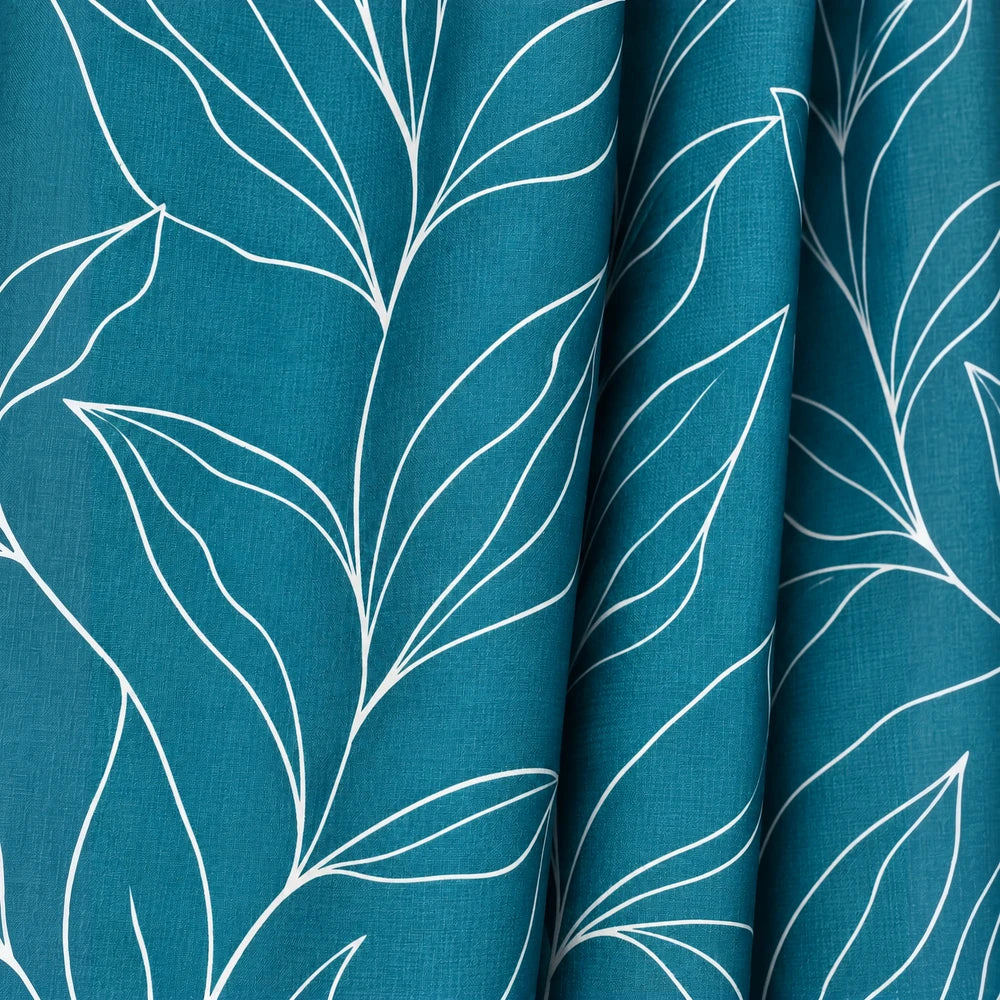Modern Leaf Paste Print Taped Lined Curtain in teal fabric featuring a white, outline leaf pattern for a contemporary window