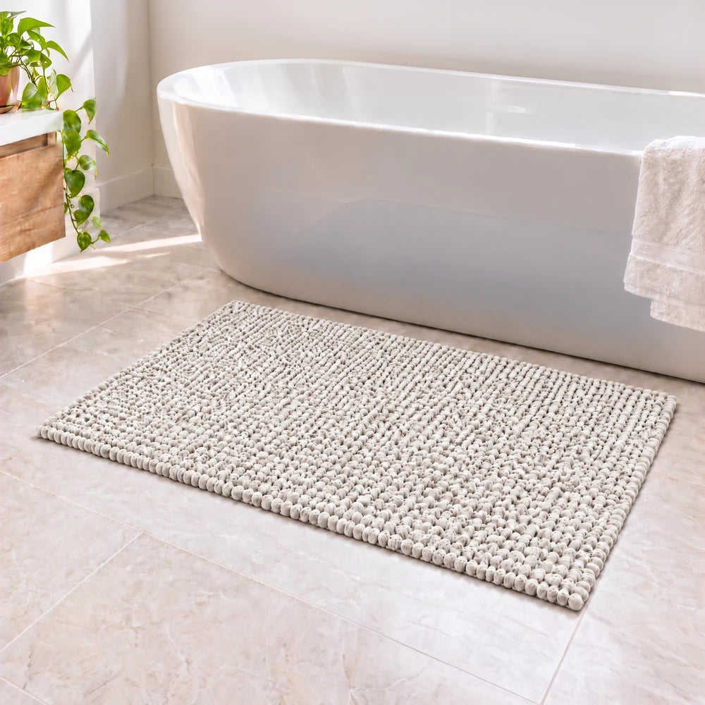 Pierre Cardin chenille bath mat in cream, soft textured 50 x 80 cm for bathroom flooring.