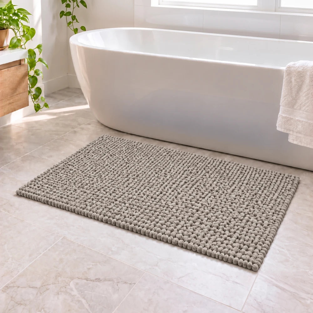 Pierre Cardin chenille bath mat in gray, soft textured rug measuring 50 x 80 cm for bathroom use.