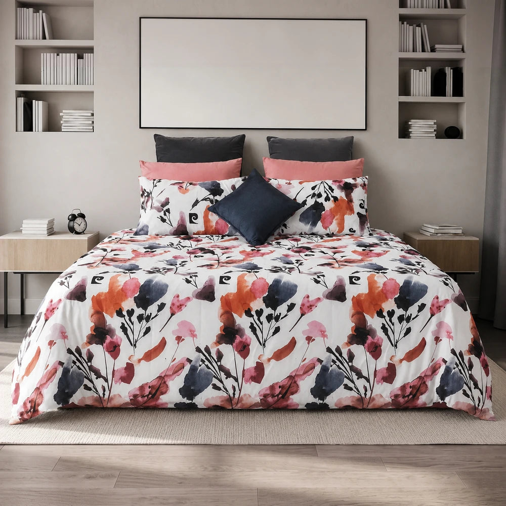Pierre Cardin Microfibre Duvet Cover Set in Lydia Floral with pink, navy and coral botanical print.