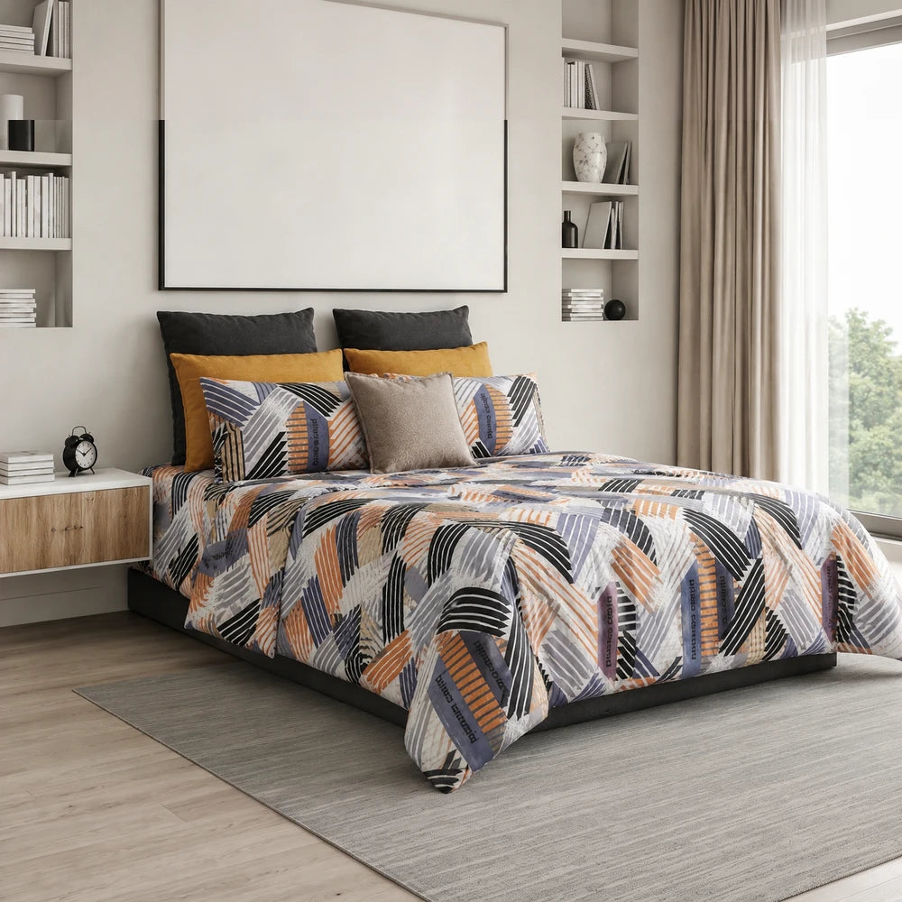 Pierre Cardin microfibre duvet cover set Tiago in orange, blue and gray geometric print on a neatly made bed.