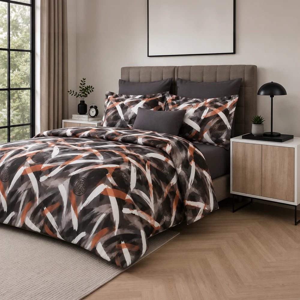 Pierre Cardin Microfibre Duvet Cover Set Reiya with abstract orange and grey pattern and dark grey pillowcases