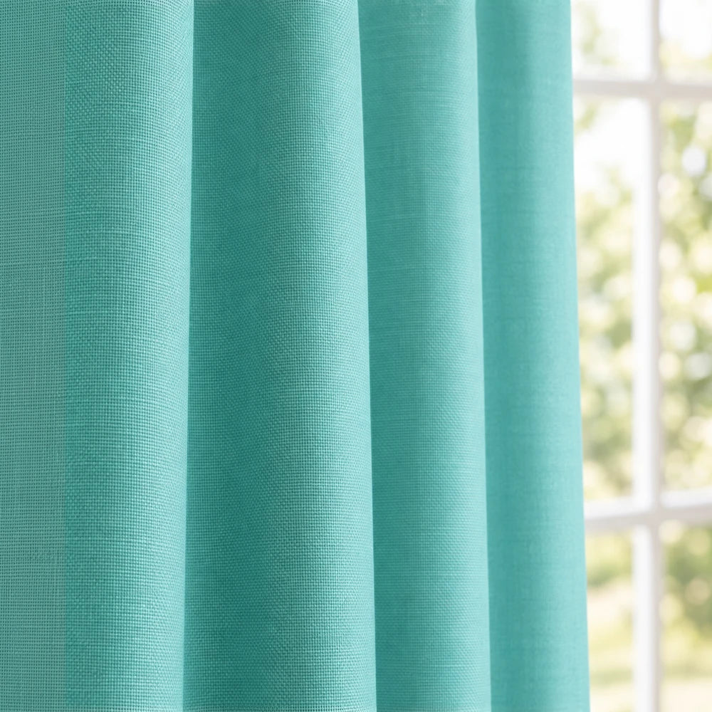 Pierre Cardin Microlinen Lined Taped Curtain in turquoise with a subtle textured weave and soft drape.