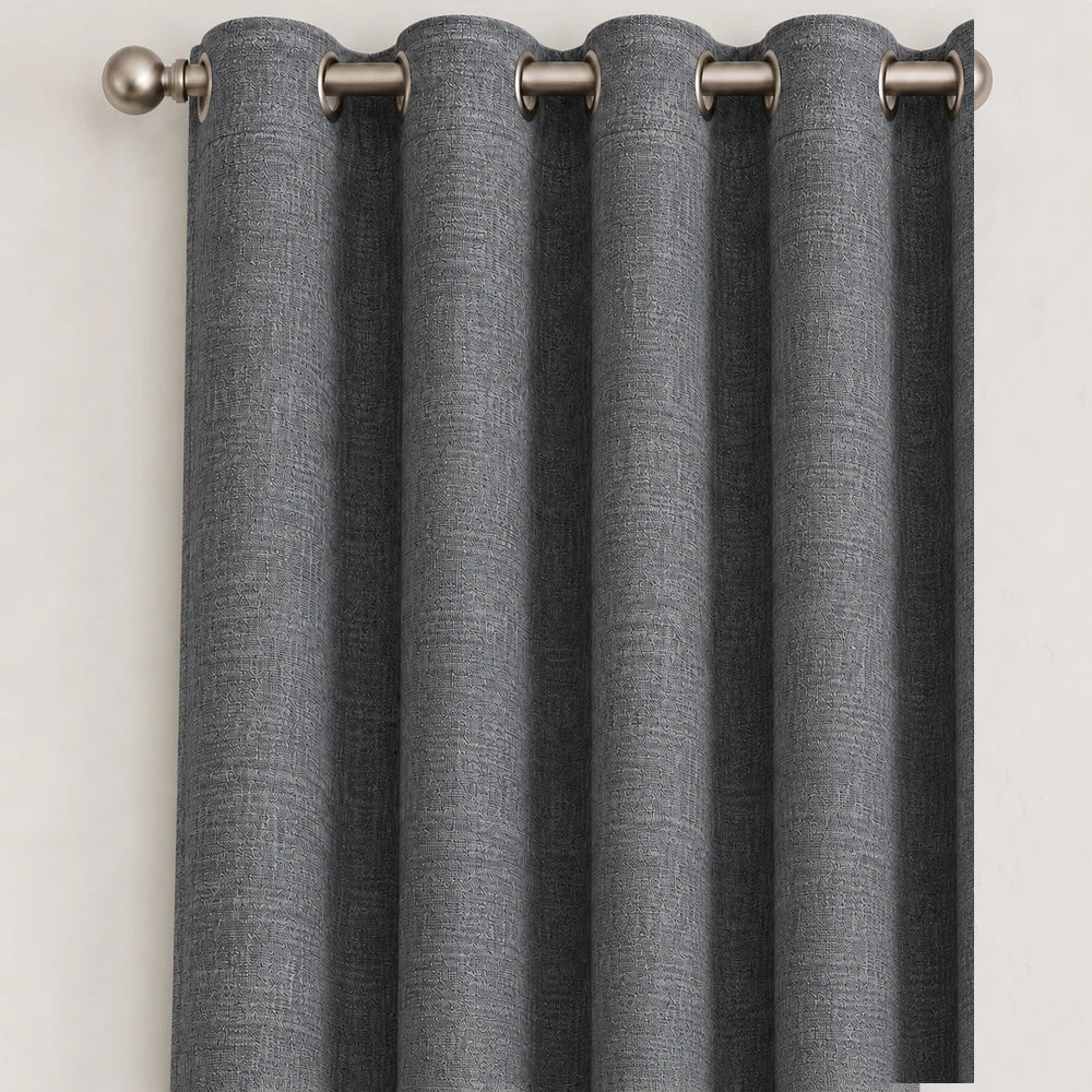 Pierre Cardin Microlinen Eyelet Lined Curtain in grey with metal grommet eyelets, showcasing textured fabric and full drape.
