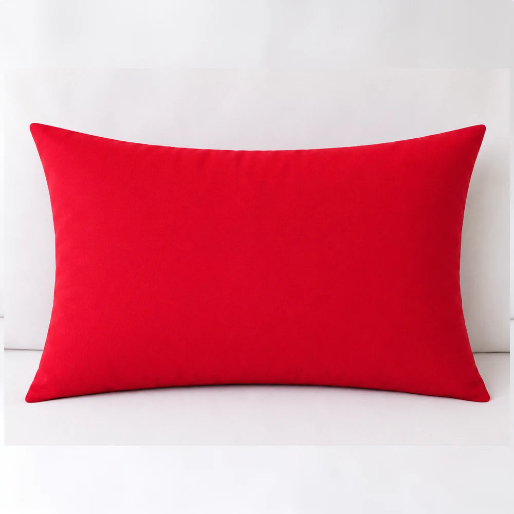 Red plain microfibre standard pillowcase shown on a white bed, smooth texture and comfortable use for everyday sleep.