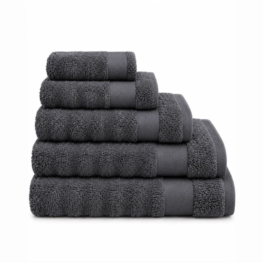 Premium ribbed zero twist cotton towels in charcoal gray, 500GSM, soft and highly absorbent, stack of five.