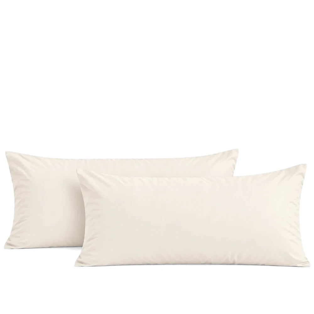Two premium soft-touch microfiber king pillowcases in a cream color, photographed on a clean white background.