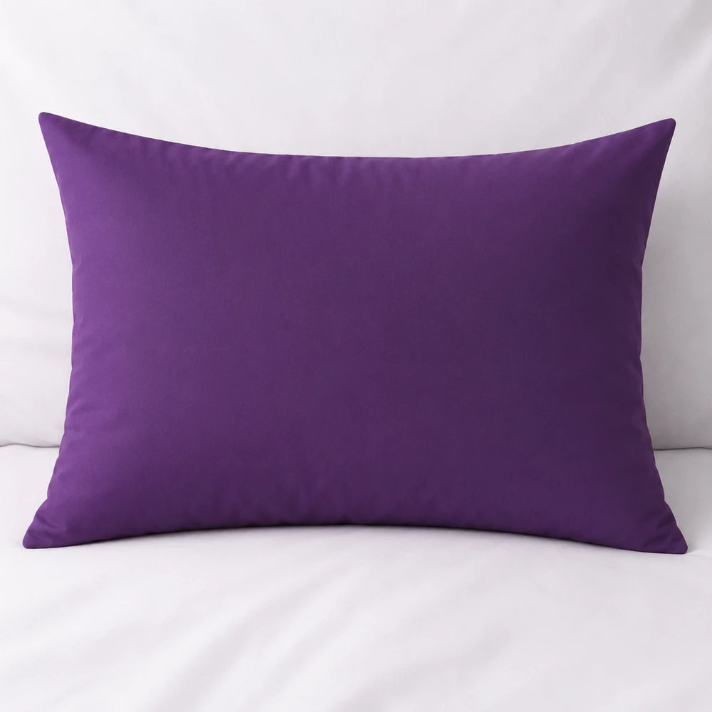 Purple plain microfibre standard pillowcase shown on a bed, soft texture, breathable fabric, smooth finish.