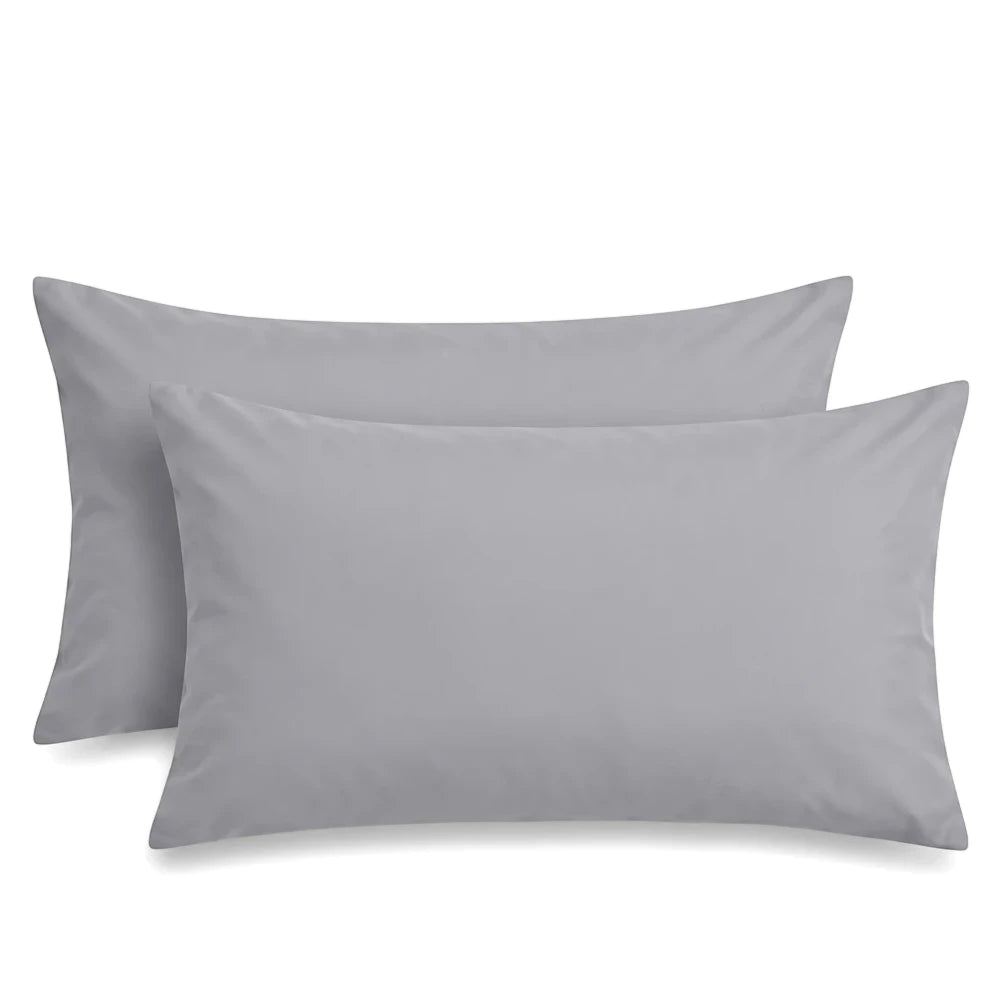 Two grey premium soft-touch microfiber king pillowcases, showcasing their smooth texture and simple design.