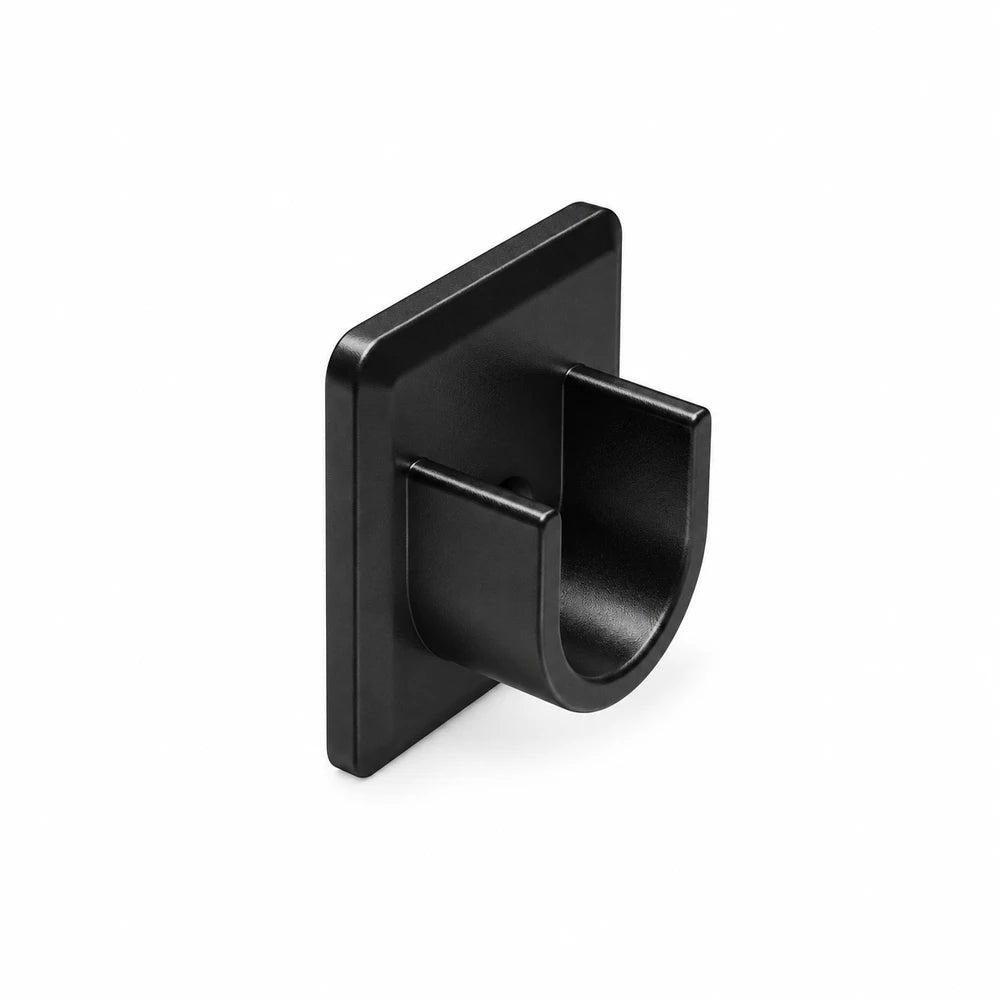 U-Inside Pole Bracket in black metal with a curved inner grip, designed for wall-mounted pole setups and secure mounting.