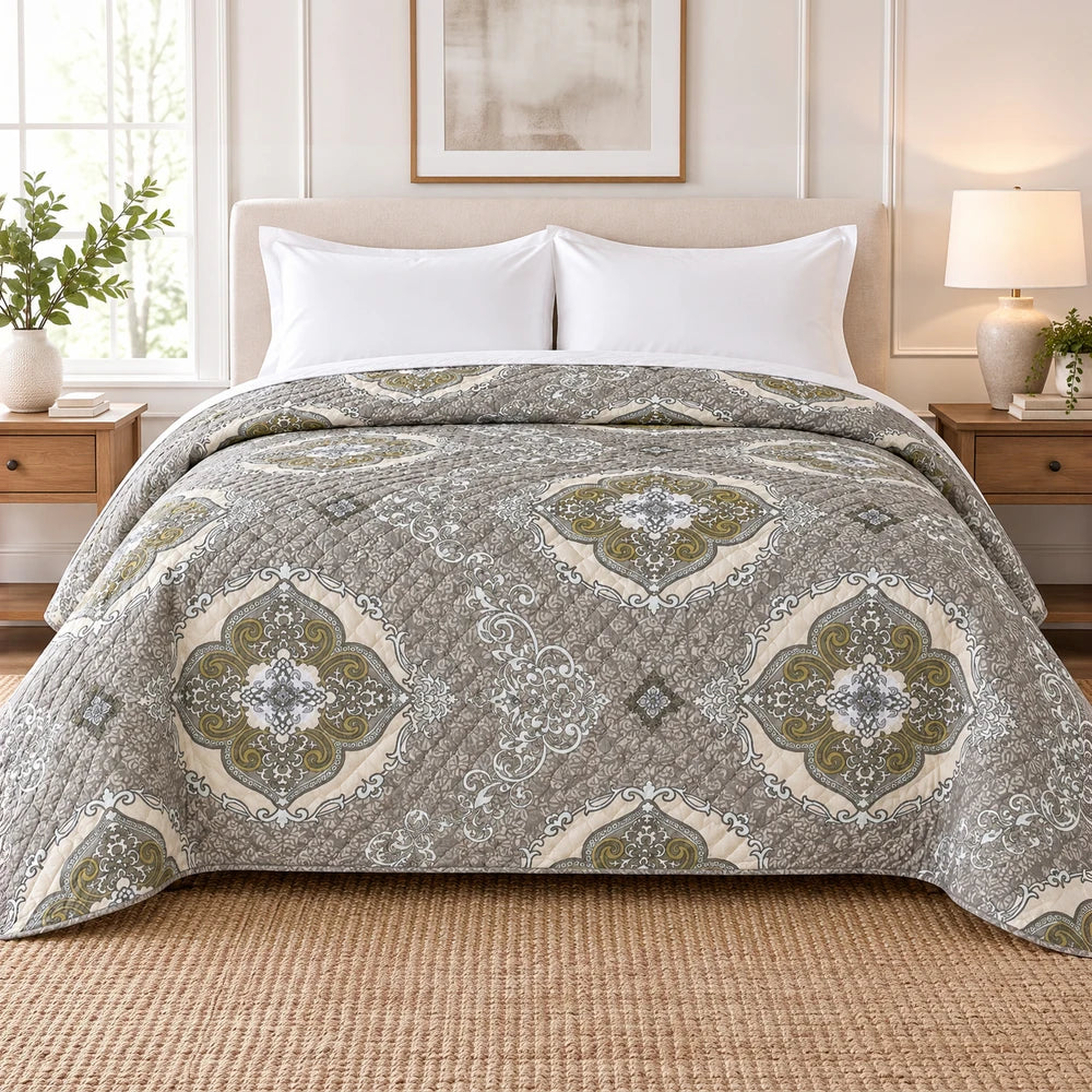 Ultrasonic 1-Piece Printed Quilt in neutral beige-gray with an ornate medallion pattern, measuring 220 x 200 cm on a bed.