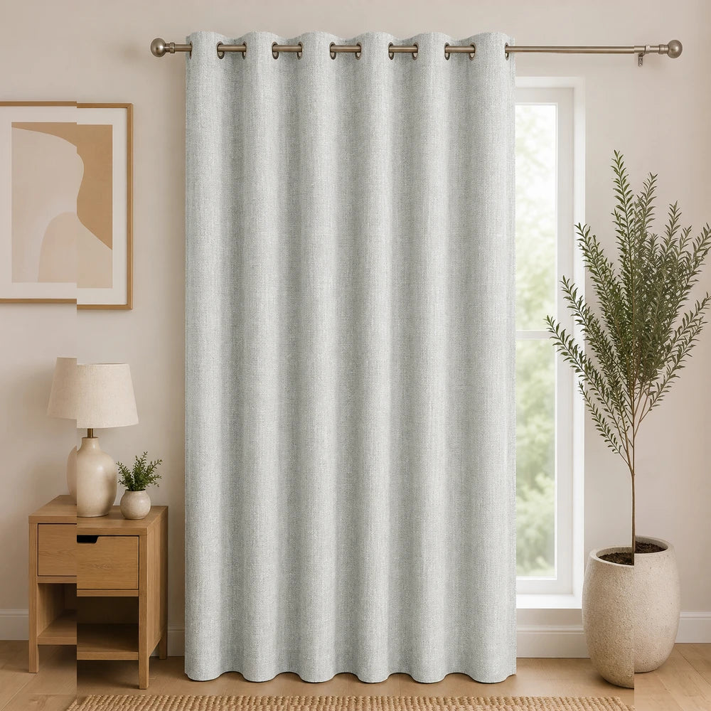 Woven Athens textured eyelet unlined curtain in light gray with metal grommets for easy hanging and soft drape.