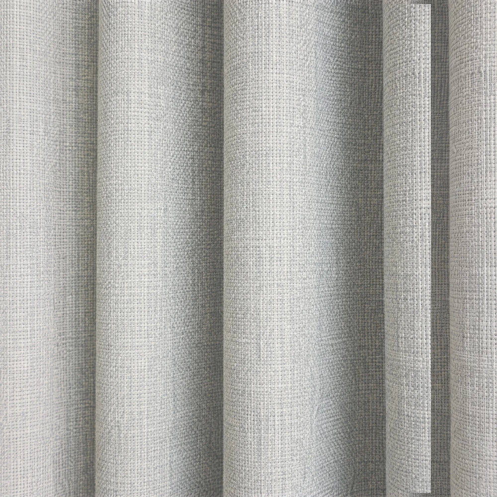 Woven Athens textured eyelet unlined curtain in light gray, featuring a soft linen-like weave and graceful drape for a